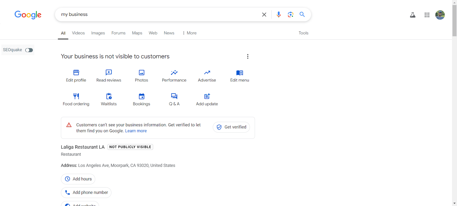 Google search result showing 'Your business is not visible to customers' with a notification prompting verification for visibility. The business name 'Laliga Restaurant LA' is marked as 'Not Publicly Visible.